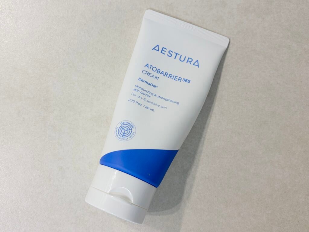 Aestura Atobarrier 365 Cream reformulated tube on a vanity, featured in our honest Aestura Atobarrier 365 Cream review.