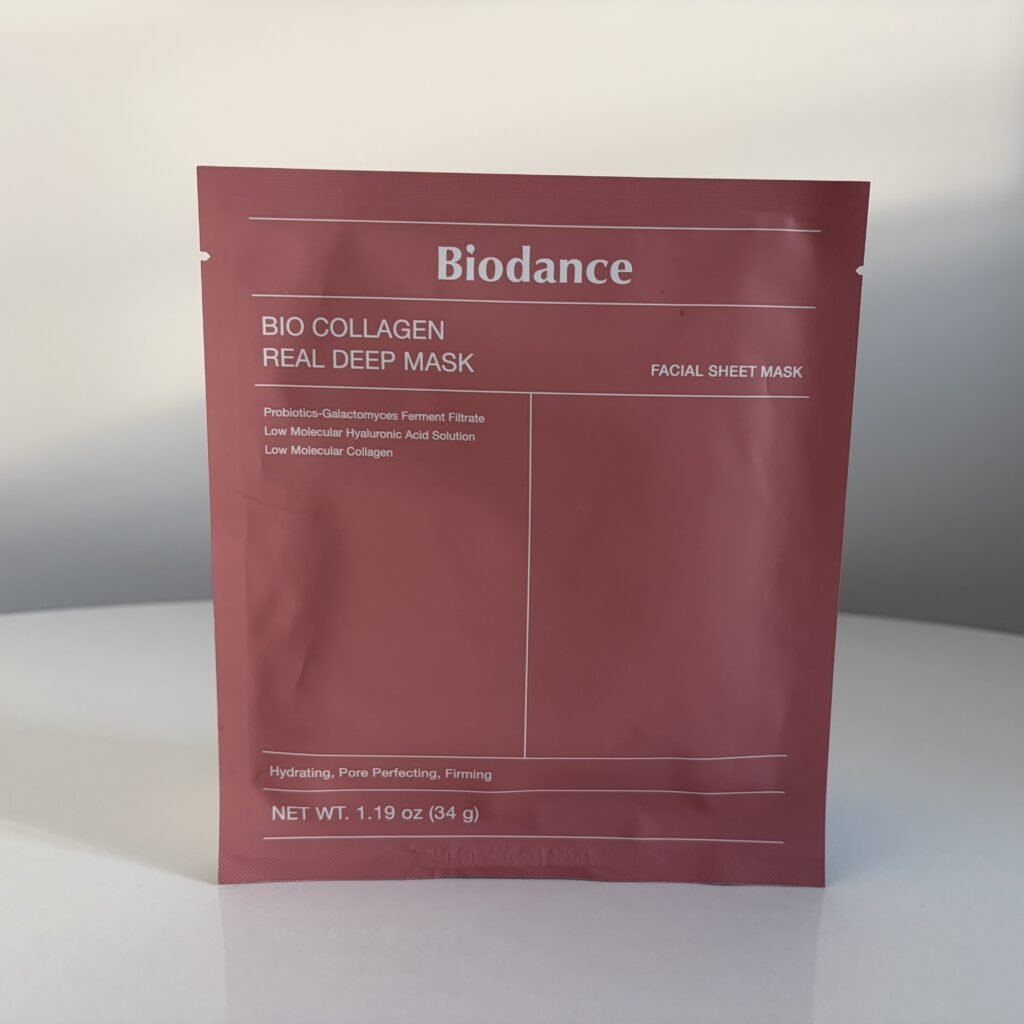 Unopened pink pouch packaging of Biodance Bio-Collagen Real Deep Mask overnight hydrogel treatment.
