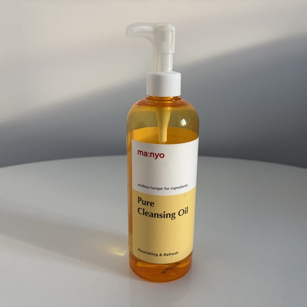 Bottle of Manyo Pure Cleansing Oil for double cleansing sebaceous filaments and waterproof sunscreen.